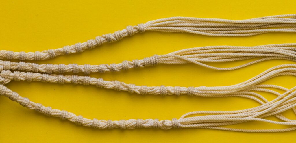 Close up of Tzitzit the knots and strings on the corner of a garment worn by Jews.