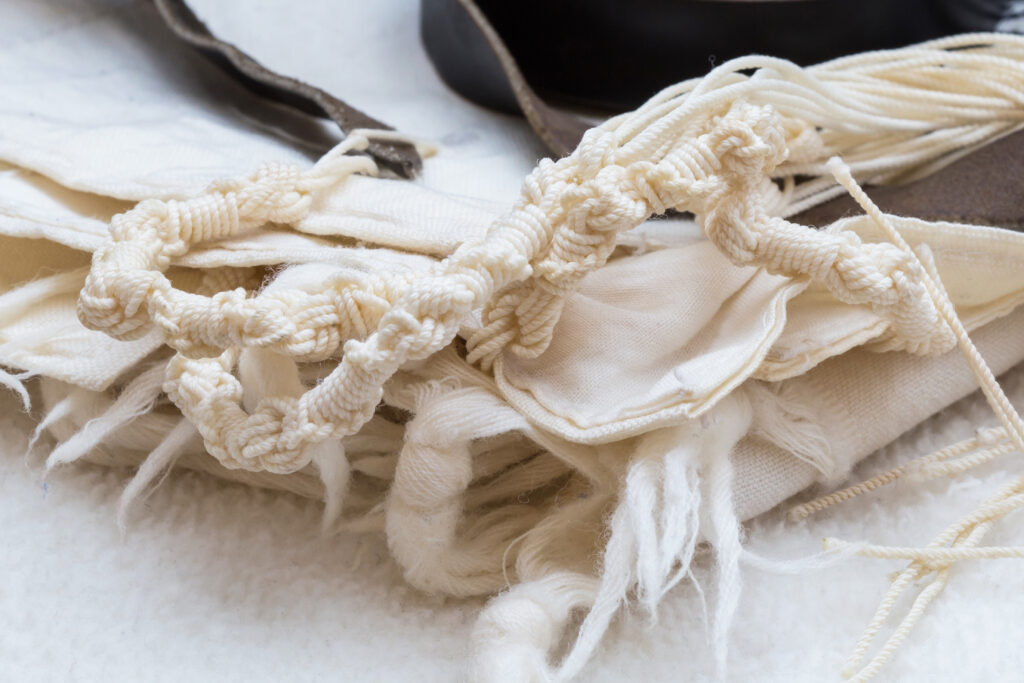 close up of tzitzit four corner garment
